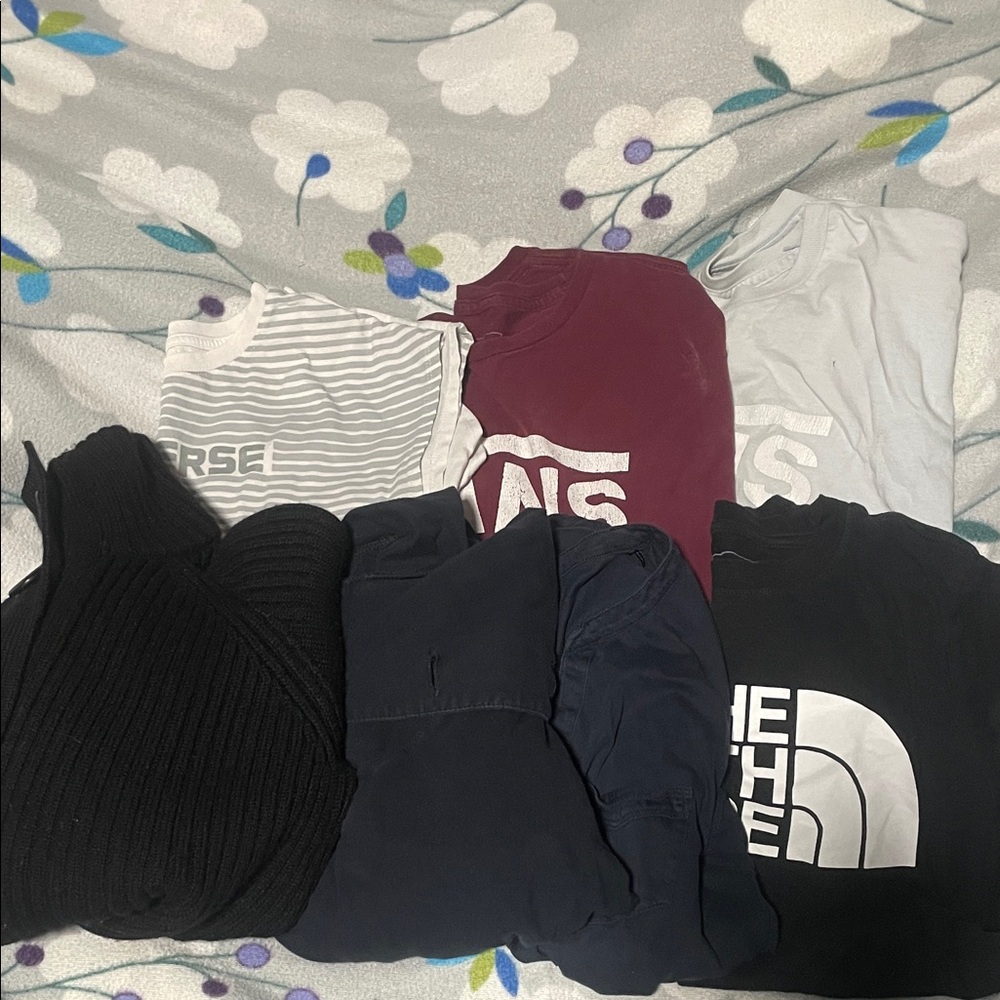 Bundle of shirts and sweaters